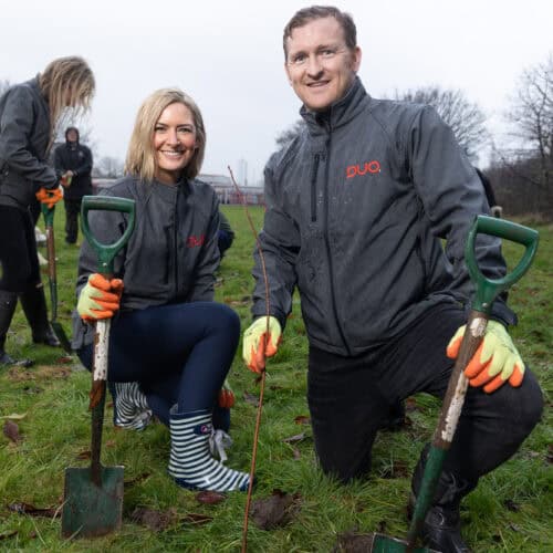 Zoe and Dale Duo Directors planting a tree