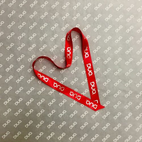 Duo Branded tissue paper with ribbon shaped into a heart