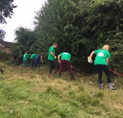 Duo Team clearing the brambles