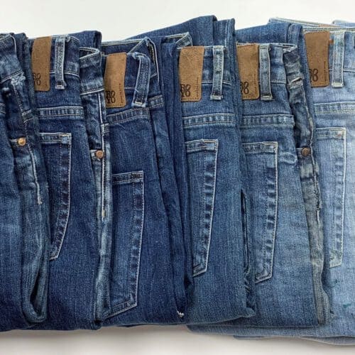 Tejidos Royo line of folded jeans in different shades of blue