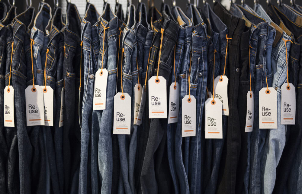 Nudie Jeans on a clothing rail with tags on