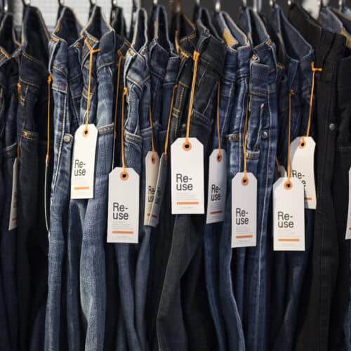 Nudie Jeans on a clothing rail with tags on