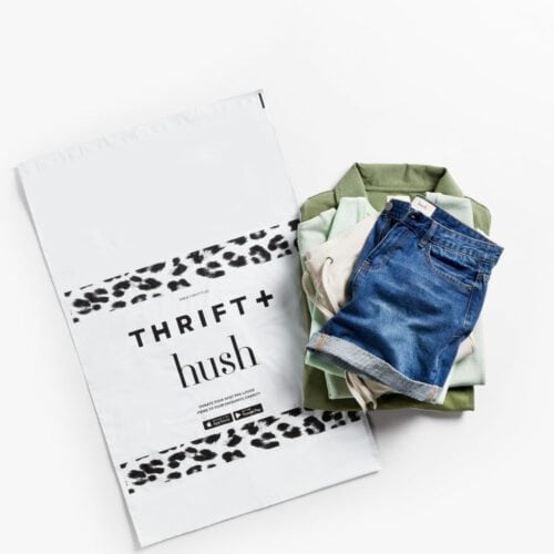 Thrift and Hush Mailing bag with clothes at the side