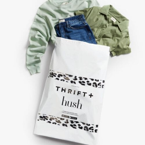 Thrift and Hush Mailing bag with clothes coming out of the bag