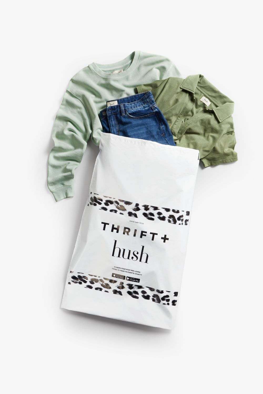 Thrift and Hush Mailing bag with clothes coming out of the bag