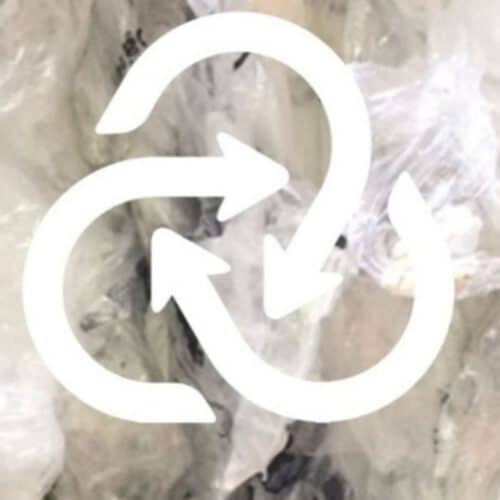 Closed Loop recycling logo on top of clear scrap