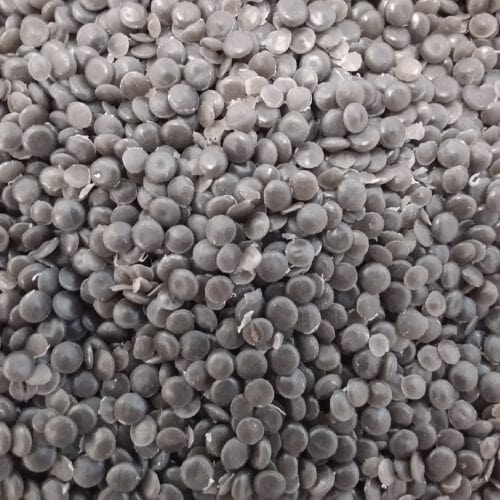 Up close image of pellets used to produce recycled mailing bags.