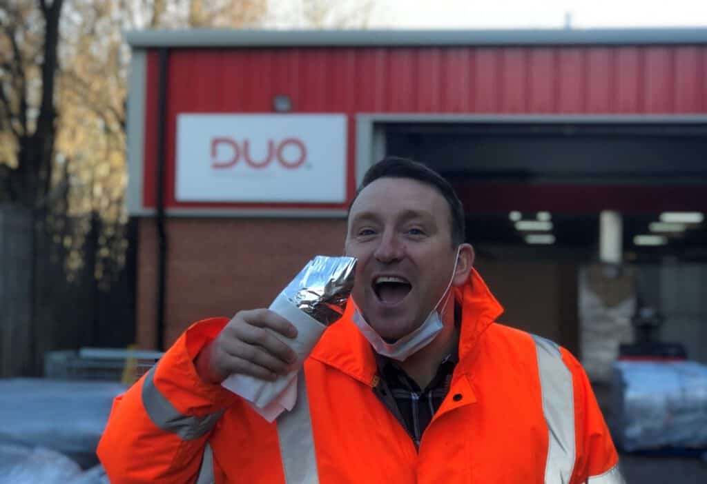 Anthony Brimelow Commercial Director enjoying Yorkshire Pudding Wrap at Duo's Christmas Markets